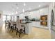 Spacious kitchen with island, stainless steel appliances, and white cabinetry at 1106 Woods Landing Dr, Minneola, FL 34715