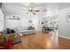 Spacious living room featuring a sectional sofa and wood floors at 120 E Holly Dr, Orange City, FL 32763