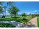 Landscaped lawn with walkway offering scenic views and bridge views at 1224 S Peninsula Dr # 511, Daytona Beach, FL 32118