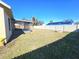 Backyard view of house and fence at 1387 Hensley Dr, Deland, FL 32724