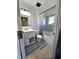 Clean bathroom with a tub, shower, and updated vanity at 1387 Hensley Dr, Deland, FL 32724