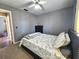 Well-lit bedroom with a full-size bed and ample closet space at 1387 Hensley Dr, Deland, FL 32724
