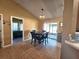 Casual dining area with a table and chairs near the kitchen at 1387 Hensley Dr, Deland, FL 32724