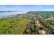 Aerial view of condos located near a river and lush greenery at 1401 S Palmetto Ave # 614, Daytona Beach, FL 32114