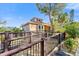 A clubhouse with wooden deck and railing has ample outdoor space and lush landscaping, creating a relaxing environment at 1401 S Palmetto Ave # 614, Daytona Beach, FL 32114