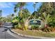 Welcoming community entrance sign surrounded by lush tropical landscaping, inviting you to The Preserve at River's Edge at 1401 S Palmetto Ave # 614, Daytona Beach, FL 32114