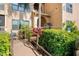 The apartment complex entrance is equipped with accessible ramps, flourishing greenery, and clear unit number signage at 1401 S Palmetto Ave # 614, Daytona Beach, FL 32114