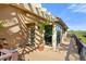 Charming condo exterior with wood deck, pergola and tropical plant in a pot at 1401 S Palmetto Ave # 614, Daytona Beach, FL 32114