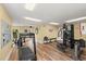 Spacious fitness center with various exercise equipment and wood floor at 1401 S Palmetto Ave # 614, Daytona Beach, FL 32114