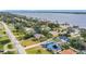 Aerial view of waterfront home with private pool and large lot at 1412 Oak Forest Dr, Ormond Beach, FL 32174