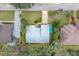 Overhead view of the house and surrounding neighborhood at 1412 Oak Forest Dr, Ormond Beach, FL 32174