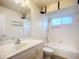 Clean bathroom with a single vanity and shower/tub combo at 1412 Oak Forest Dr, Ormond Beach, FL 32174