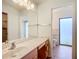 Bathroom features a single vanity and shower/tub combo at 1412 Oak Forest Dr, Ormond Beach, FL 32174