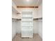 Large walk-in closet with ample shelving and hanging space at 1412 Oak Forest Dr, Ormond Beach, FL 32174