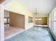 Bright dining room with tile floor and chandelier at 1412 Oak Forest Dr, Ormond Beach, FL 32174