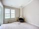 Living room showcasing a vintage fireplace and large window at 1412 Oak Forest Dr, Ormond Beach, FL 32174