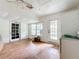 Spacious living area with wood flooring and access to backyard at 1412 Oak Forest Dr, Ormond Beach, FL 32174