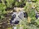 Single-Gathering home surrounded by lush trees at 1450 Alden St, Deland, FL 32720