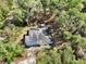 Single-Gathering home on a wooded lot with driveway at 1450 Alden St, Deland, FL 32720