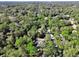 Community overview showing houses surrounded by trees at 1450 Alden St, Deland, FL 32720