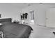 Main bedroom with a walk-in closet and adjoining bathroom at 1450 Alden St, Deland, FL 32720