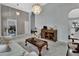 Living room with neutral walls, a comfy sofa, and a large window at 1450 Alden St, Deland, FL 32720