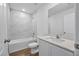 Bathroom boasts a bathtub, toilet, vanity with a quartz countertop at 1481 Amy Cir, Deltona, FL 32738