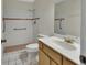 Bathroom featuring a walk-in shower and vanity at 2 Villa Villar Ct # 02, Deland, FL 32724
