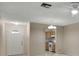 Entryway with view of kitchen and living room at 2 Villa Villar Ct # 02, Deland, FL 32724