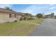 View of house and surrounding landscape, showing street at 2 Villa Villar Ct # 02, Deland, FL 32724