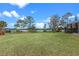 Spacious backyard offering a serene lake view at 2032 Golden Arm Rd, Deltona, FL 32738