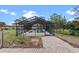 Relaxing screened-in pool with a view of the lake at 2032 Golden Arm Rd, Deltona, FL 32738