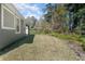 Spacious backyard with lush greenery and privacy at 204 Wellington Woods Ave, Deland, FL 32724