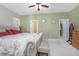 Main bedroom with ensuite bathroom access and walk-in closet at 204 Wellington Woods Ave, Deland, FL 32724