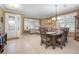 Bright entryway with a view of the dining room and living room areas at 204 Wellington Woods Ave, Deland, FL 32724