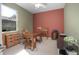Bright home office features built-in shelving and wood desk at 204 Wellington Woods Ave, Deland, FL 32724