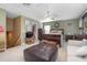Large main bedroom with plush seating and ensuite bathroom at 204 Wellington Woods Ave, Deland, FL 32724