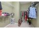 Large walk-in closet with ample shelving and hanging space at 204 Wellington Woods Ave, Deland, FL 32724