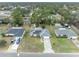Aerial view of house and surrounding neighborhood at 216 Hickory Ave, Orange City, FL 32763
