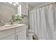 Simple bathroom with shower and updated vanity at 216 Hickory Ave, Orange City, FL 32763