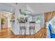 Modern kitchen with stainless steel appliances and breakfast bar at 216 Hickory Ave, Orange City, FL 32763