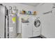 Convenient laundry room with washer, dryer, and storage at 216 Hickory Ave, Orange City, FL 32763