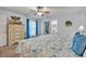 Main bedroom with ensuite bathroom and large bed at 216 Hickory Ave, Orange City, FL 32763