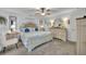 Spacious main bedroom with a large bed and plenty of storage at 216 Hickory Ave, Orange City, FL 32763