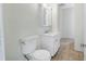 Clean bathroom with vanity, medicine cabinet, and tiled floors at 229 S Adams St, Daytona Beach, FL 32114