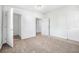 Bedroom with white shiplap accent wall and multiple closets at 229 S Adams St, Daytona Beach, FL 32114