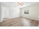 Bright bedroom with wood-look floors and a window at 229 S Adams St, Daytona Beach, FL 32114