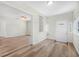 Open entryway with light wood floors and built-in shelving at 229 S Adams St, Daytona Beach, FL 32114