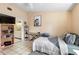 Bedroom with a single bed, keyboard, and a black and white picture of a lion at 245 Terrace Hill Blvd # 1E, Debary, FL 32713
