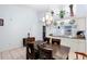 Bright dining area with kitchen pass-through at 245 Terrace Hill Blvd # 1E, Debary, FL 32713